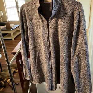 Purple/white tweet type colors warm jacket. Full zipper with pockets